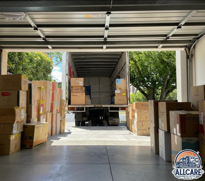 AllCare Removalists Perth truck being loaded with organized boxes at a warehouse — professional logistics and moving service in Perth.